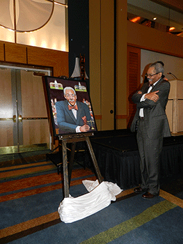 Chief Judge Robert M. Bell and painting presented by FCCIP at the CANDO Judicial Conference